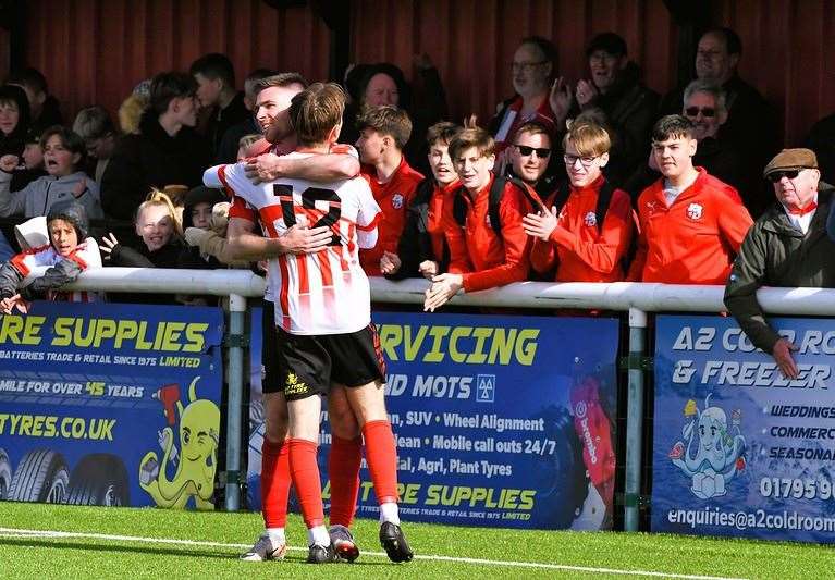 Jacob Lambert is congratulated on his goal - his 16th of the season Picture: Marc Richards